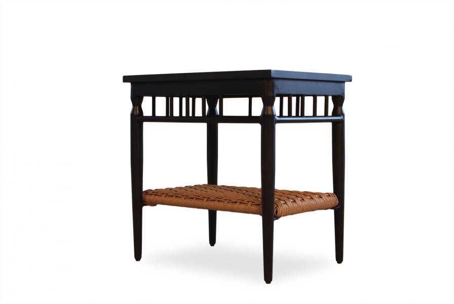 A dark wooden side table with a flat top and an open shelf featuring a woven rattan design at the bottom, isolated against a white background. This model also includes an insert for optional customization.