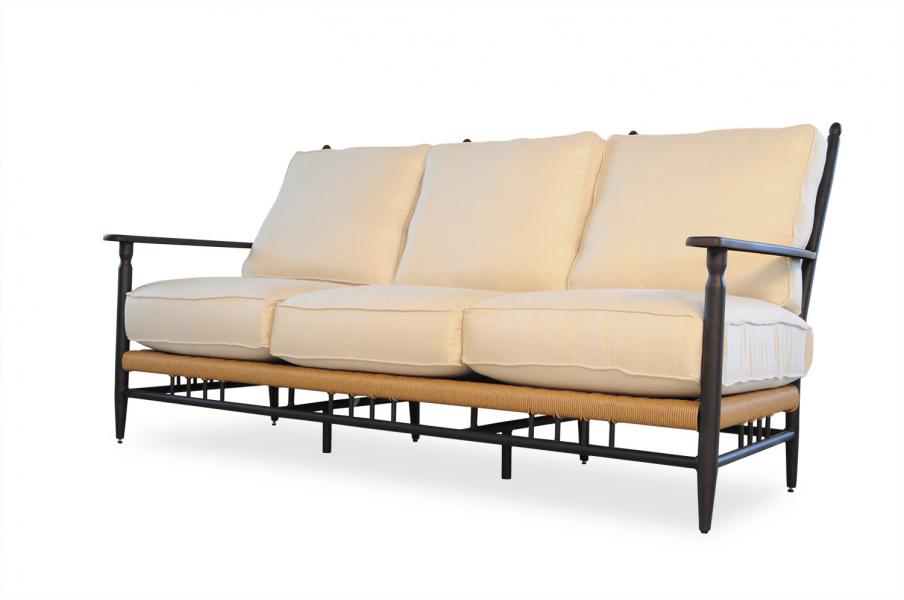 A modern three-seater sofa with beige cushions on a black metal frame, featuring wooden armrests and a built-in stove, isolated on a white background.