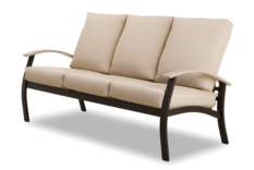 A three-seater outdoor sofa with a dark brown frame and light beige cushions, featuring an integrated fire pit, isolated on a white background.