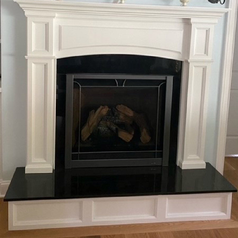 Fireplace with raised hearth