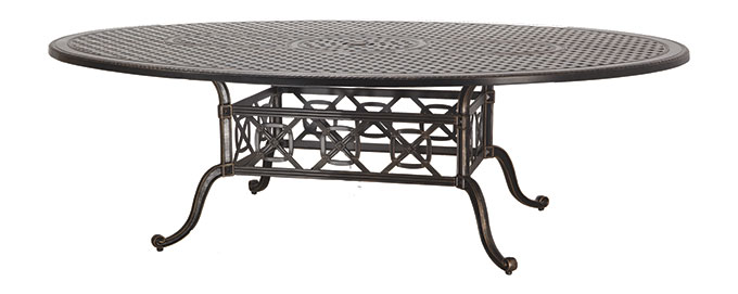 A Gensun Grand Terrace oval-shaped, wrought iron outdoor dining table with an intricate lattice design and curved legs, isolated on a white background.