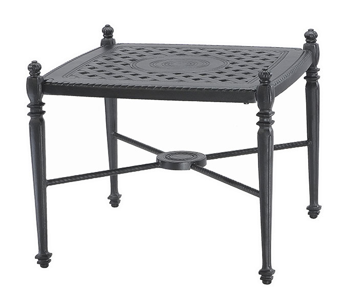 A square metal side table with intricate Gensun Grand Terrace lattice designs on the top and ornamental finials on each corner, painted in a dark color, featuring a lower shelf with a centered circular