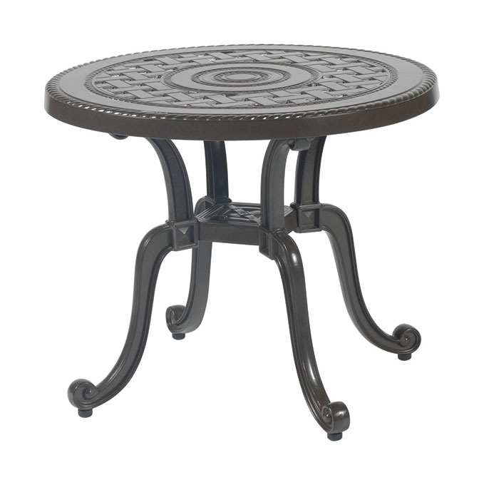 A round metal Gensun Grand Terrace table with an ornately designed top and curved legs, finished in dark bronze.