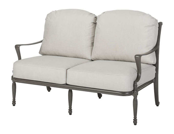A two-seater sofa with plush beige cushions and an elegant Gensun Bel Air gray metal frame with ornate detailing and small round feet.