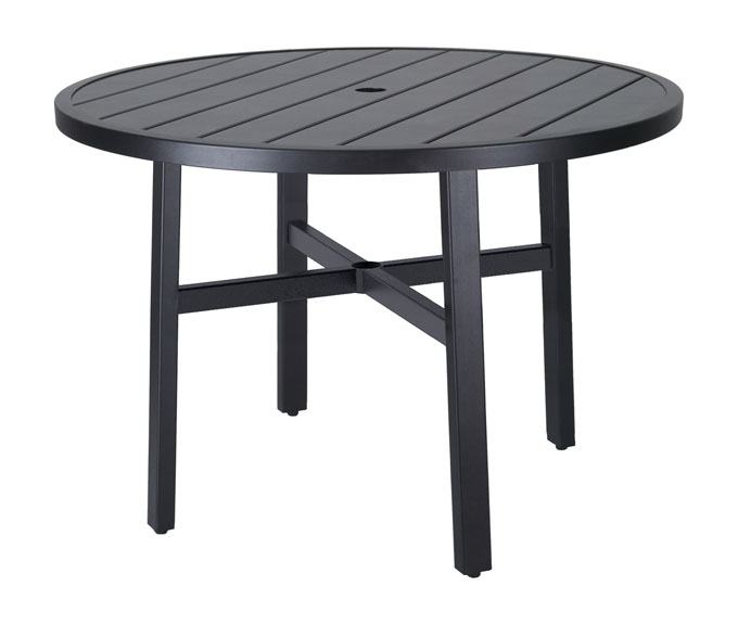 A round, black Gensun Plank outdoor table with slatted top and a central hole, presumably for an umbrella, supported by a four-leg cross base.