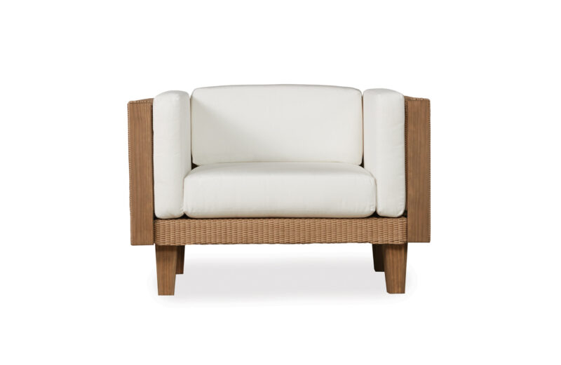 A modern single-seater sofa with white cushions and a wooden frame featuring woven side panels, displayed against a white background.