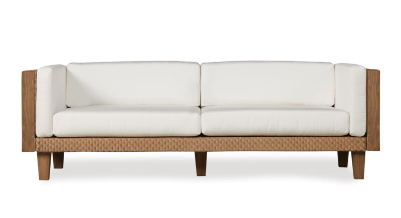 A modern two-seater couch with white cushions and a wooden frame, set against a white background.