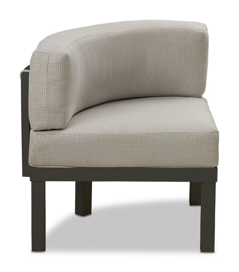 A modern armless chair with light gray upholstery and a black wooden frame, isolated on a white background.