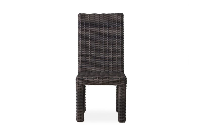 A dark brown wicker dining chair isolated on a white background, showing a sleek, tall backrest and a simple, elegant design.