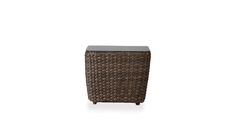 A modern outdoor wicker coffee table with a glass top, isolated on a white background.