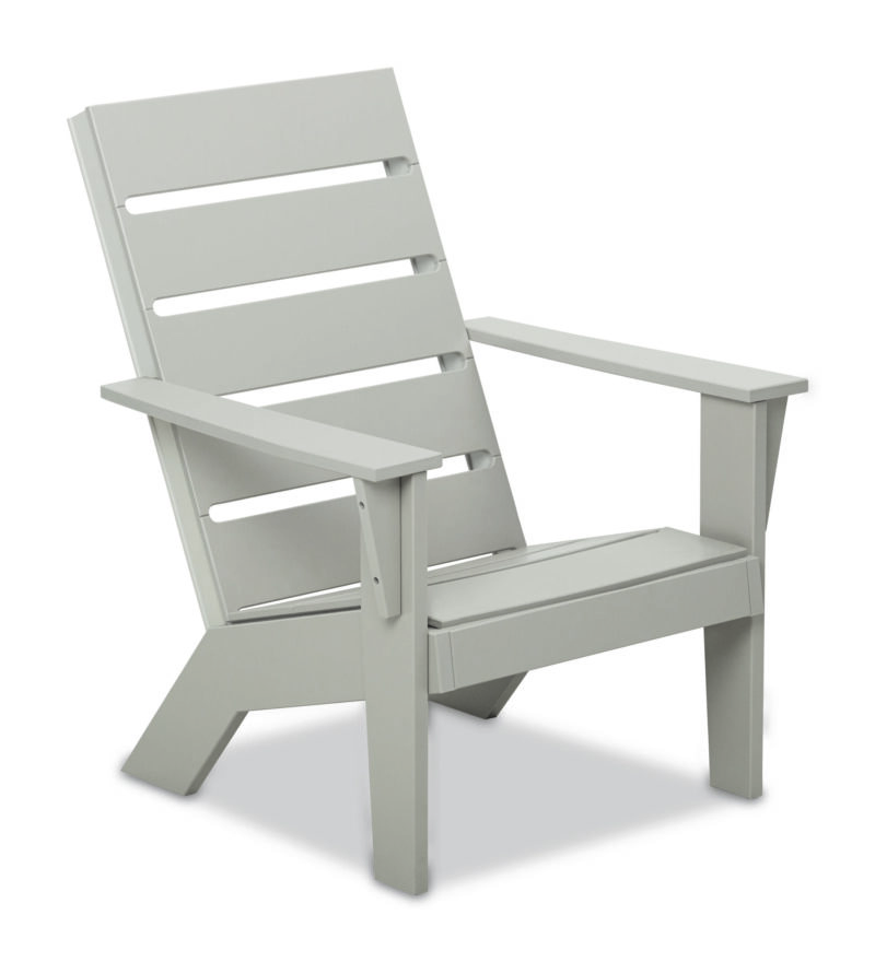 A modern, light gray adirondack chair made of wood or a wood-like material, featuring a slatted back and seat with wide armrests, shown isolated on a white background.