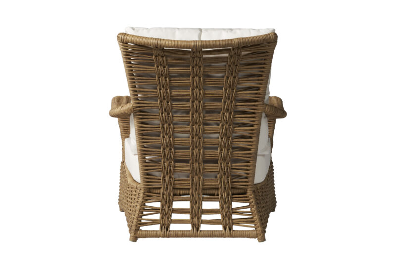 A wicker rattan armchair with a plush white cushion, showcased against a white background, emphasizing its intricate weaving and sturdy design.