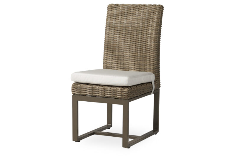 A modern outdoor dining chair featuring a high wicker back and metal frame, complemented by a light cushioned seat isolated on a white background.