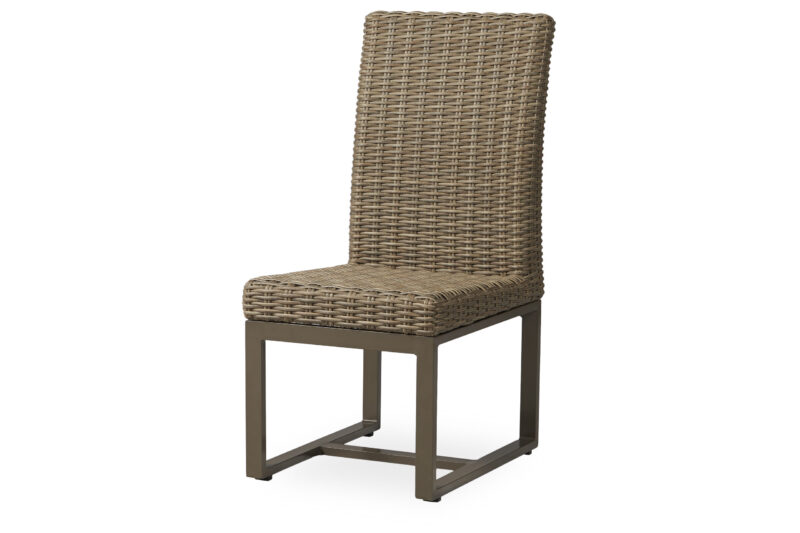 A modern dining chair with a steel frame and woven wicker back and seat, isolated on a white background.
