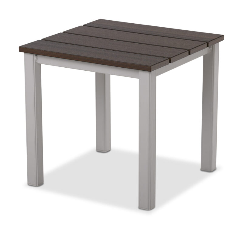 A modern, small rectangular table featuring a rustic dark brown slatted polymer top and four sturdy grey metal legs on a white background.