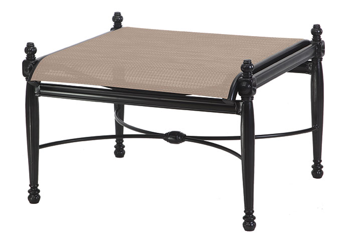A stylish Gensun Bel Air outdoor ottoman with a black metal frame and a beige woven top.