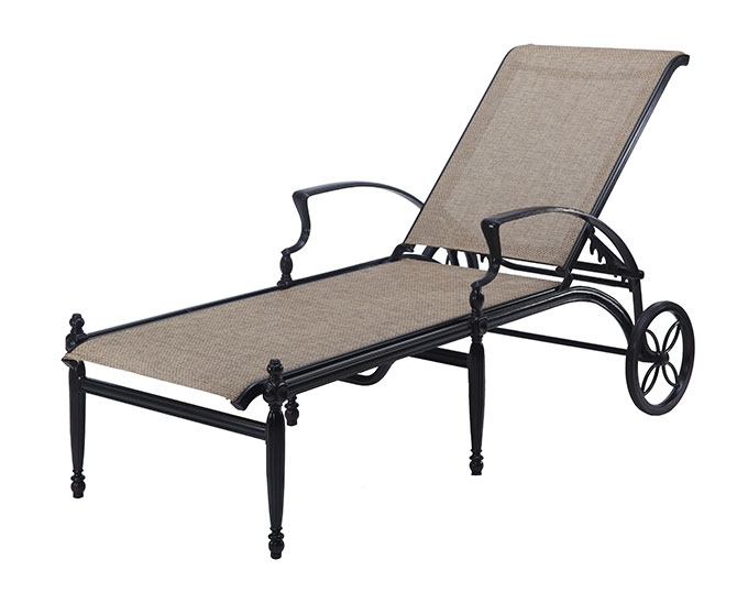 An elegant Gensun Bel Air outdoor chaise lounge with a black metal frame and beige fabric, featuring curving armrests and rear wheels for mobility.
