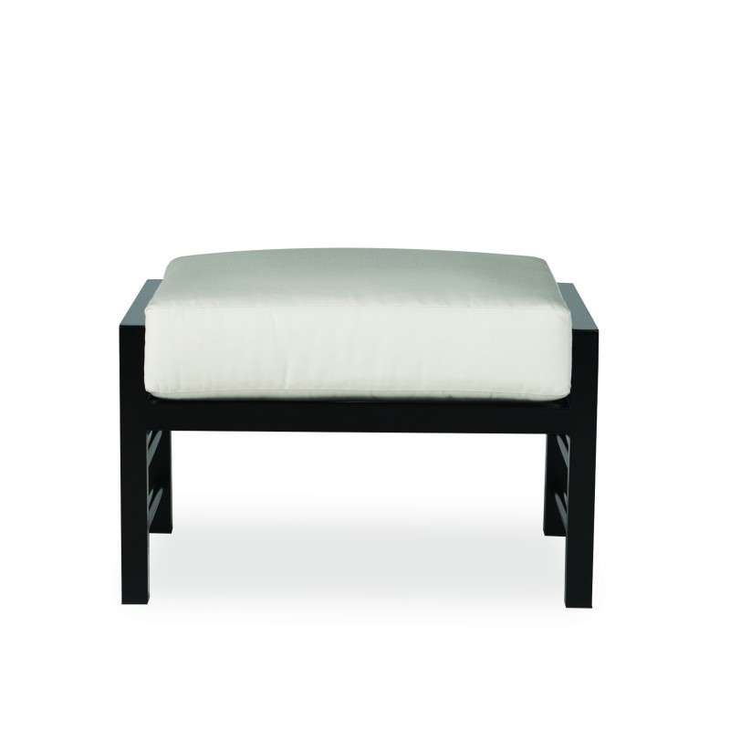 A modern ottoman with a black frame and a light beige cushion, displayed against a plain white background.