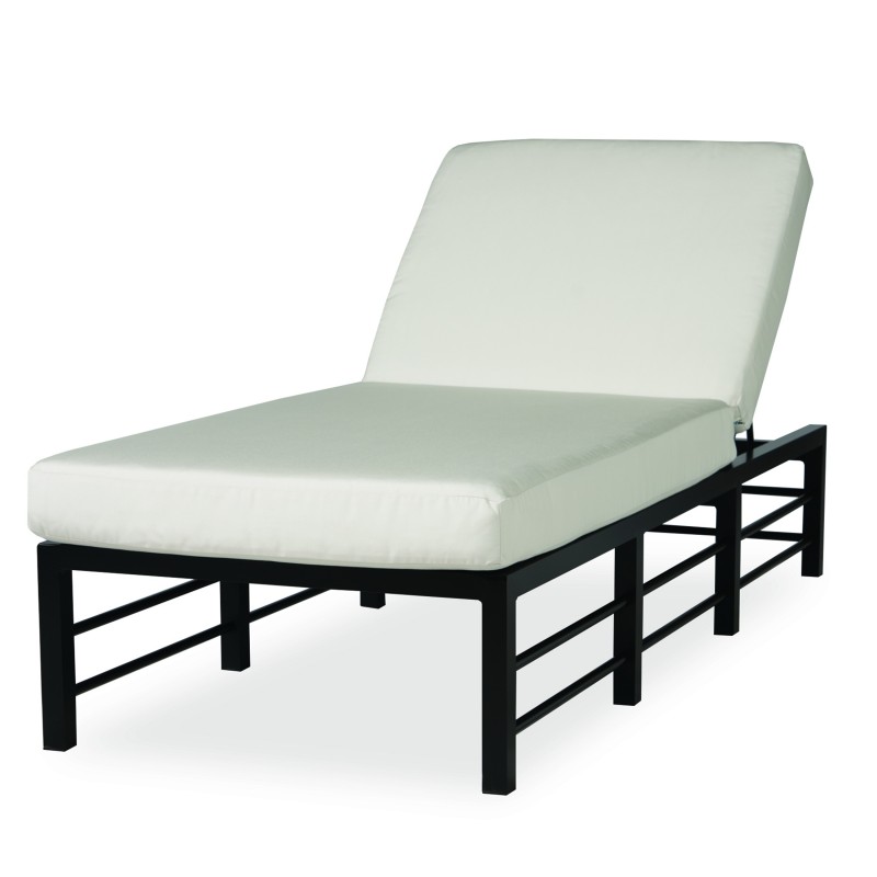 A modern outdoor chaise lounge with a black metal frame and a plush, light beige cushion, set against a white background.