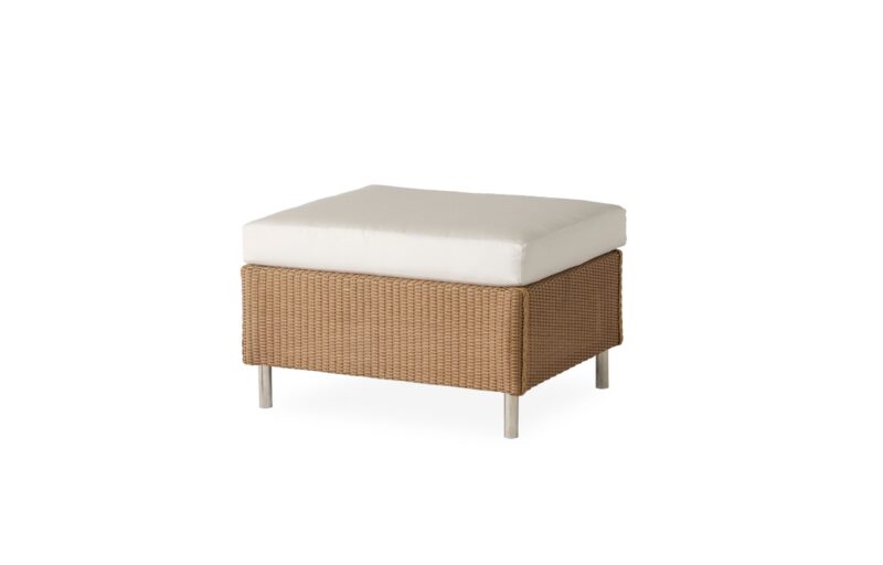 A simple modern outdoor ottoman with a beige wicker base and a white cushion, isolated on a white background.