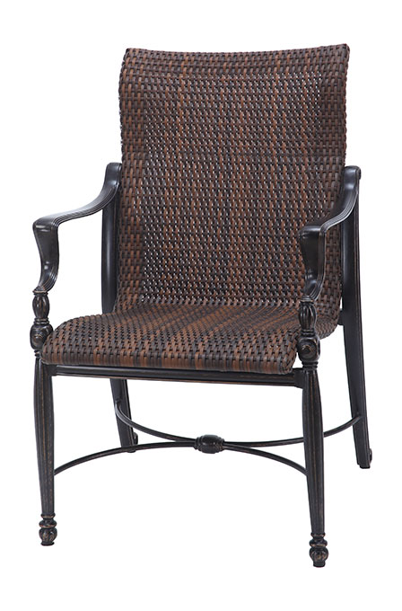 A classic Gensun Bel Air wicker chair with a dark, intricately woven back and seat, featuring ornate metal armrests and legs in a black finish.