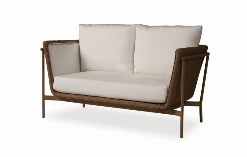 A modern two-seater sofa with a wooden frame and woven sides, featuring thick, white cushions on both the seat and backrest, isolated on a white background.