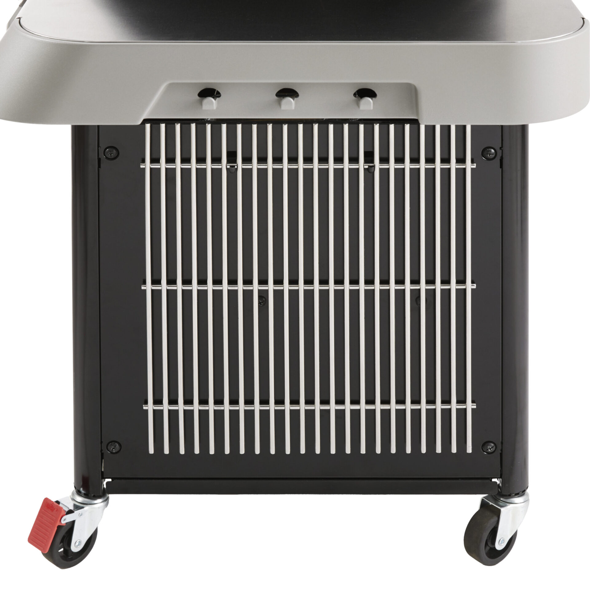 Close-up view of the bottom part of a metal grill cart with a grid shelf and wheels, two of which have red locking brakes.