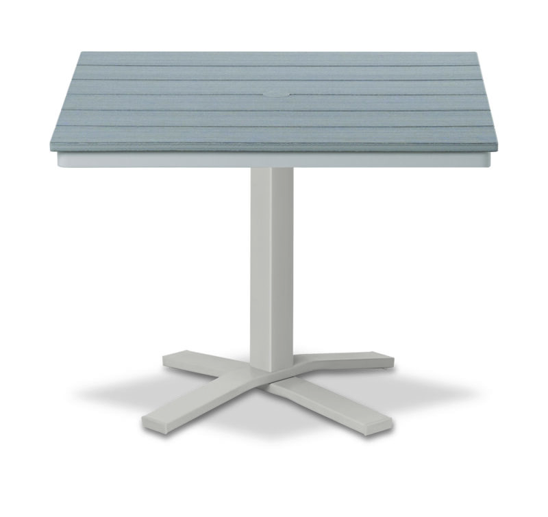 A modern outdoor table with a rectangular, slate-gray polymer top and a white x-shaped base.