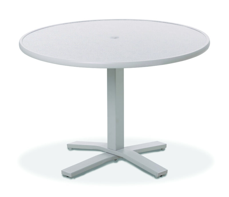 A modern, round white table with a single pedestal base, featuring a four-footed metal stand on a plain white background.