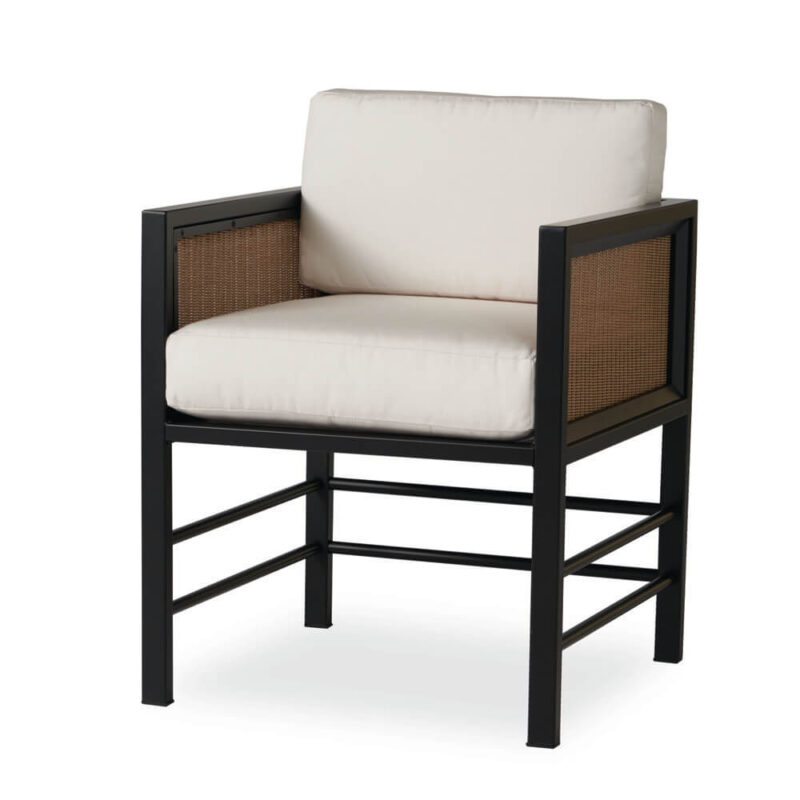 A modern outdoor armchair with a black frame, beige cushions, and woven brown back and sides, isolated on a white background.