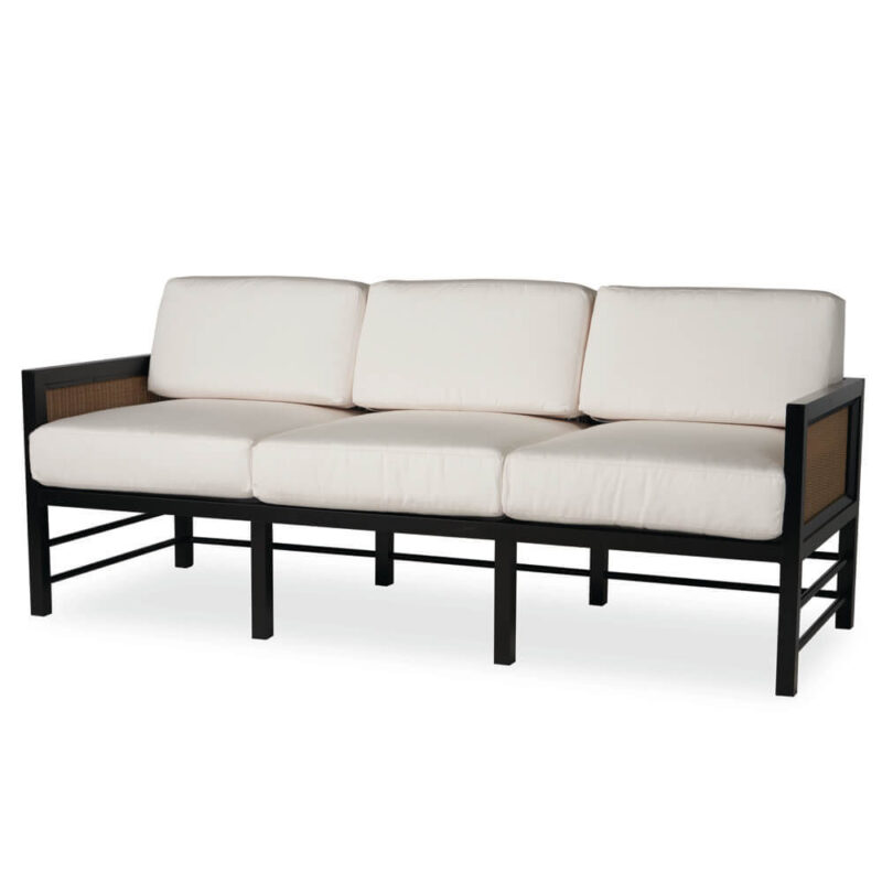 A modern three-seat sofa with a black metal frame and light beige cushions, featuring a mesh side panel design on the arms.