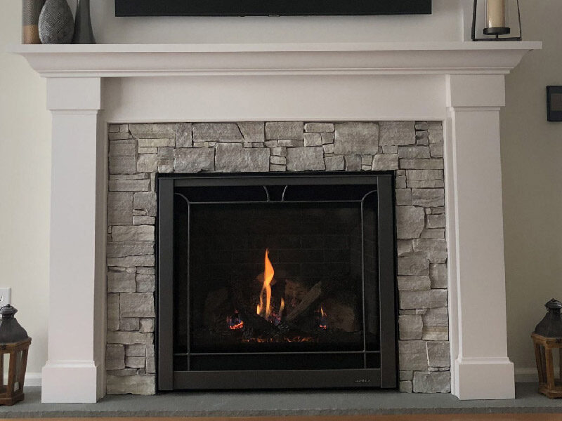 Fireplace mantel and surrounds