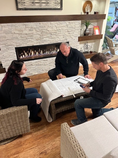New construction discussion between people in showroom