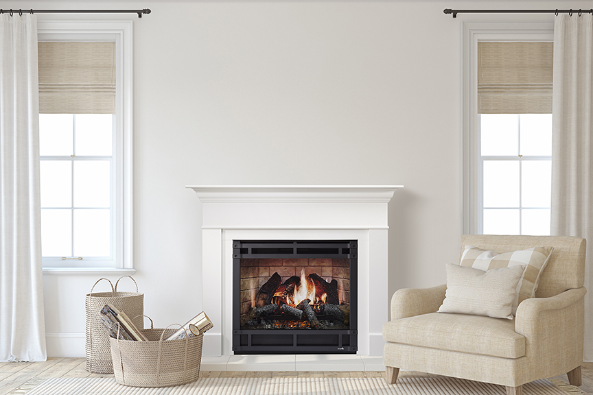 A cozy room featuring a SimpliFire Inception Electric Fireplace with a white mantle, flanked by two windows with beige curtains. A beige armchair and a wicker basket filled with firewood are